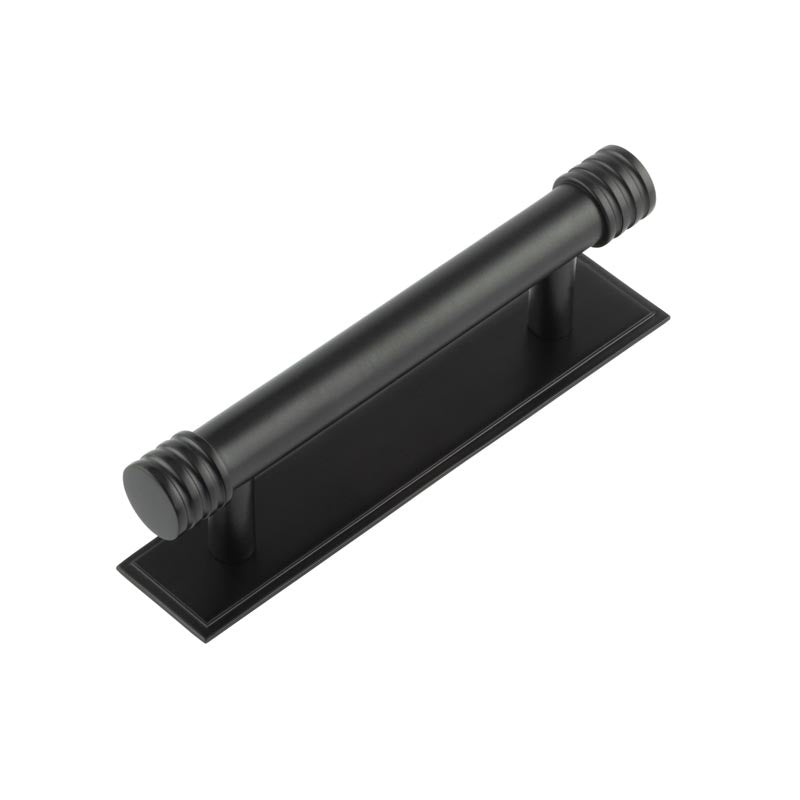 This is an image showing the Frelan - Hoxton Sturt Cabinet Handles 96mm Ctrs Stepped Backplate Matt Black available to order from T.H. Wiggans Ironmongery in Kendal