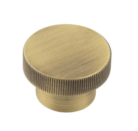 This is an image showing the Hoxton - Thaxted AB 40mm Line Knurled Cupboard Knob available to order from T.H. Wiggans Ironmongery in Kendal