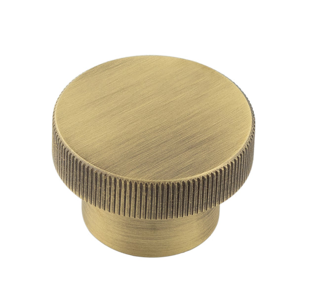 This is an image showing the Hoxton - Thaxted AB 40mm Line Knurled Cupboard Knob available to order from T.H. Wiggans Ironmongery in Kendal