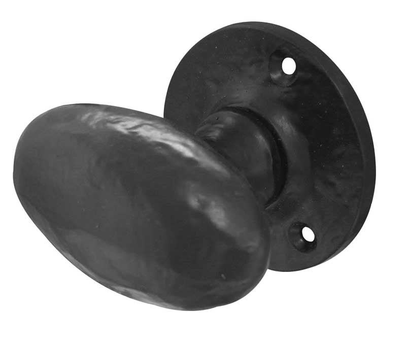 This is an image showing the Frelan - Oval Shaped Mortice Knobs - Antique Black available to order from T.H. Wiggans Ironmongery in Kendal