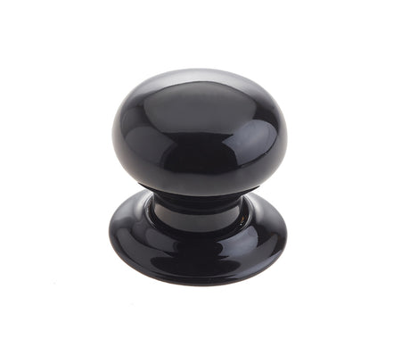 This is an image showing the Frelan - Black Porcelain Unsprung Mortice Knobs available to order from T.H. Wiggans Ironmongery in Kendal