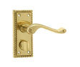 This is an image showing the Frelan - Georgian Suite Door Handle on Privacy Plate Polished Brass available to order from T.H. Wiggans Ironmongery in Kendal