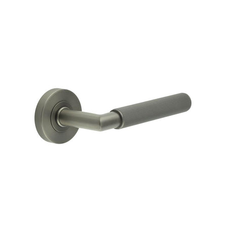 This is an image showing the Frelan - GM Mitred Linear Knurled Lever on Round Rose 316g PVD available to order from T.H. Wiggans Ironmongery in Kendal