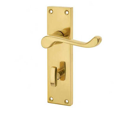 This is an image showing the Frelan - Victorian Scroll Door Handle on Bathroom Plate Polished Brass available to order from T.H. Wiggans Ironmongery in Kendal