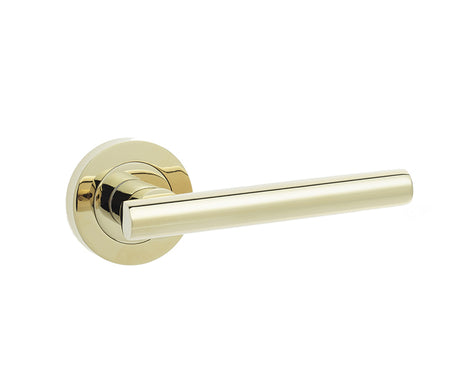 This is an image showing the Frelan - Petra Lever Handles on Round Rose - PVD Brass available to order from T.H. Wiggans Ironmongery in Kendal