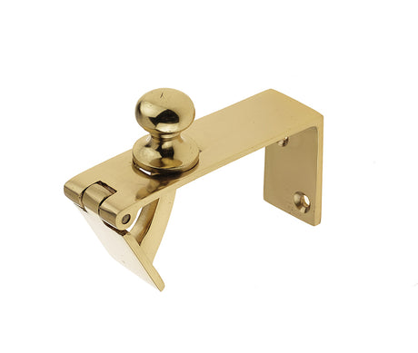 This is an image showing the Frelan - Counter Flap Catch - Polished Brass available to order from T.H. Wiggans Ironmongery in Kendal