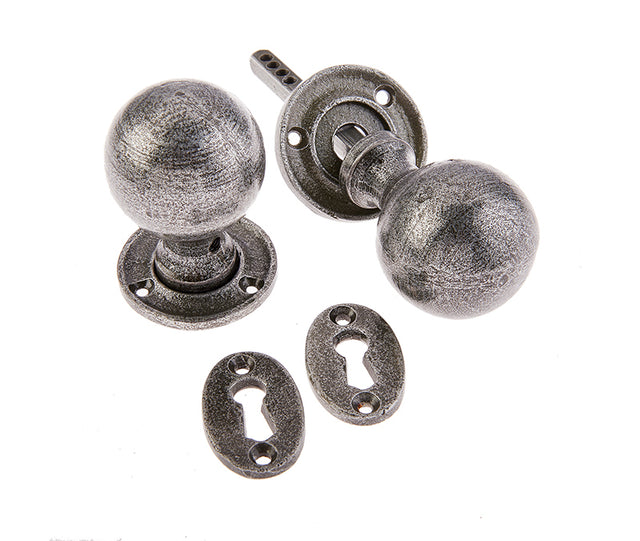 This is an image showing the Frelan - Valley Forge Round Mortice Knobs - Pewter available to order from T.H. Wiggans Ironmongery in Kendal