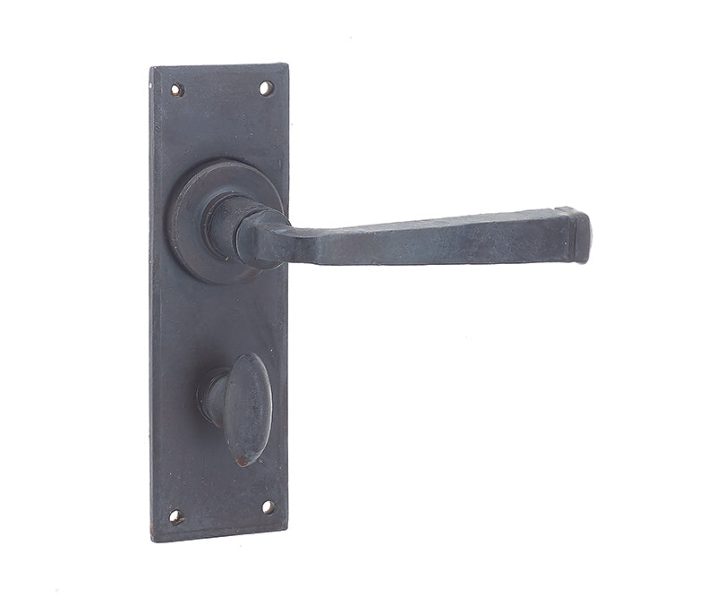 This is an image showing the Frelan - Valley Forge Bathroom Lock Handles on Backplate - Beeswax available to order from T.H. Wiggans Ironmongery in Kendal