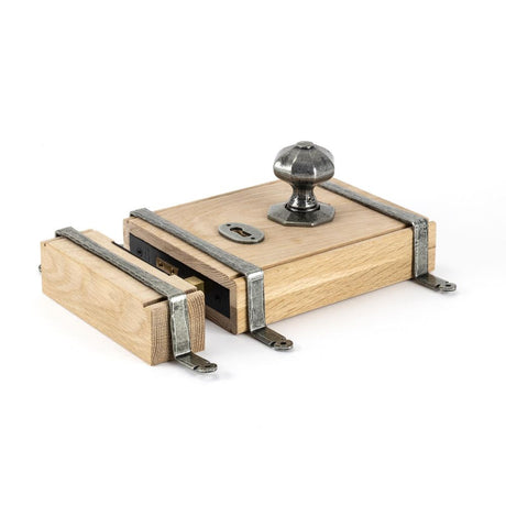 This is an image showing From The Anvil - Pewter Oak Box Lock & Octagonal Knob Set available from T.H Wiggans Architectural Ironmongery in Kendal, quick delivery and discounted prices