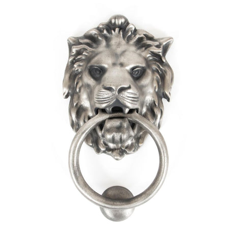 This is an image of From The Anvil - Antique Pewter Lion Head Door Knocker available to order from T.H Wiggans Architectural Ironmongery in Kendal, quick delivery and discounted prices.
