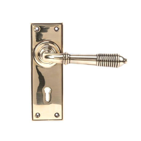 This is an image of From The Anvil - Aged Brass Reeded Lever Lock Set available to order from T.H Wiggans Architectural Ironmongery in Kendal, quick delivery and discounted prices.