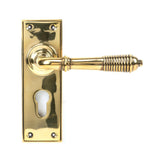 This is an image of From The Anvil - Aged Brass Reeded Lever Euro Lock Set available to order from T.H Wiggans Architectural Ironmongery in Kendal, quick delivery and discounted prices.