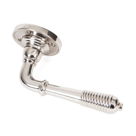 This is an image showing From The Anvil - Polished Nickel Reeded Lever on Rose Set available from trade door handles, quick delivery and discounted prices