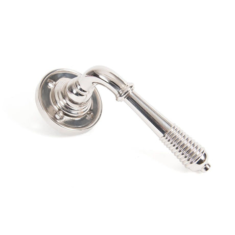 This is an image of From The Anvil - Polished Nickel Reeded Lever on Rose Set available to order from T.H Wiggans Architectural Ironmongery in Kendal, quick delivery and discounted prices.