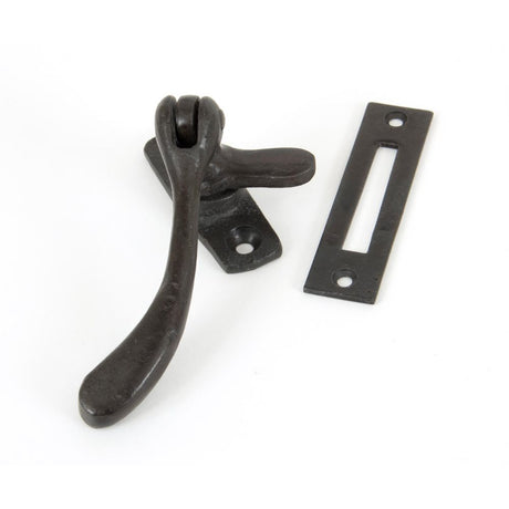 This is an image showing From The Anvil - Beeswax Handmade Peardrop Fastener available from T.H Wiggans Architectural Ironmongery in Kendal, quick delivery and discounted prices