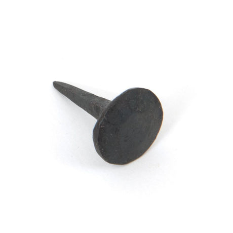 This is an image showing From The Anvil - Beeswax 1" Handmade Nail (16mm HD DIA) available from T.H Wiggans Architectural Ironmongery in Kendal, quick delivery and discounted prices
