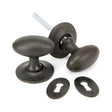 This is an image of From The Anvil - Beeswax Oval Mortice/Rim Knob Set available to order from T.H Wiggans Architectural Ironmongery in Kendal, quick delivery and discounted prices.