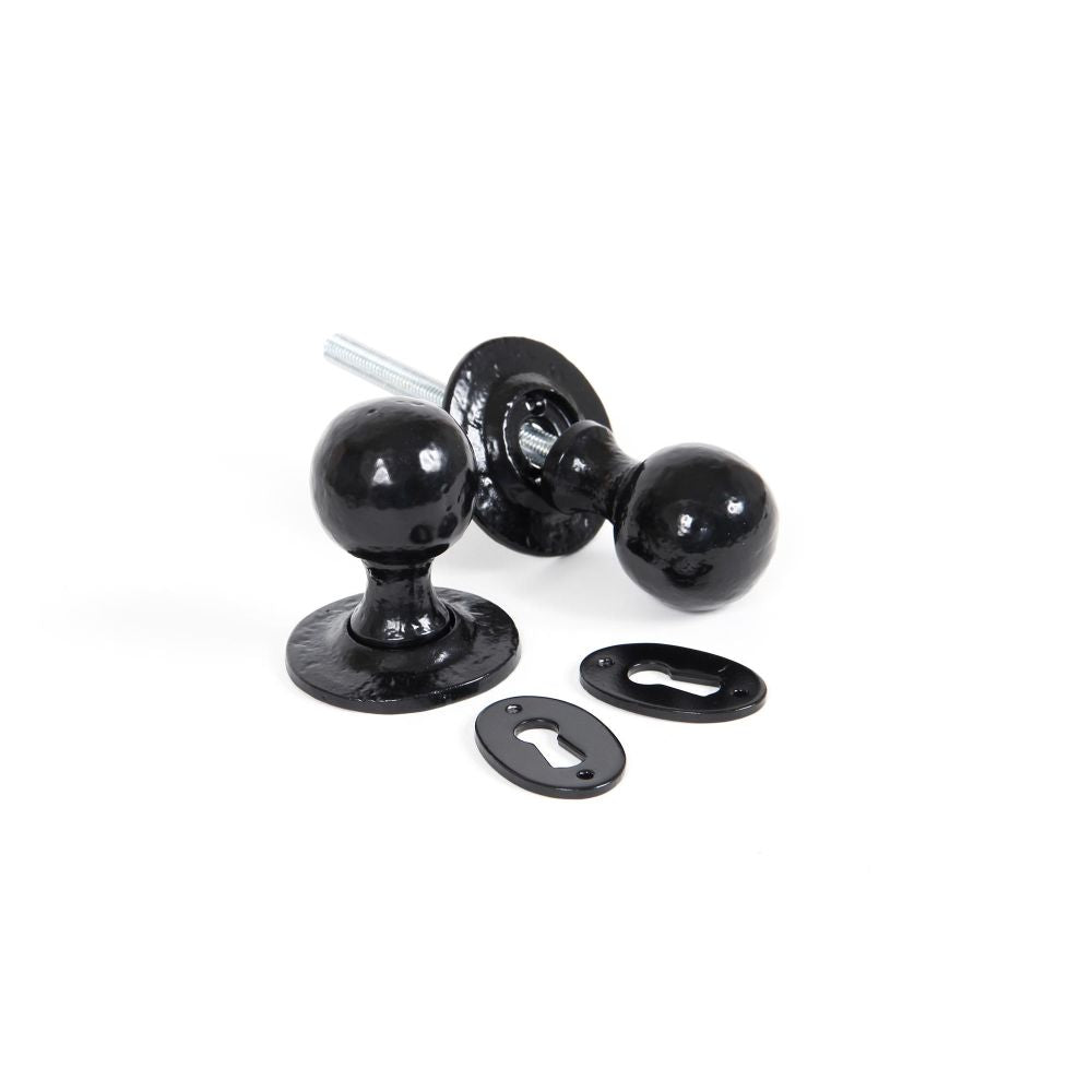 This is an image of From The Anvil - Black Round Mortice/Rim Knob Set available to order from T.H Wiggans Architectural Ironmongery in Kendal, quick delivery and discounted prices.