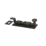 This is an image showing From The Anvil - Beeswax 4" Cranked Knob Bolt available from T.H Wiggans Architectural Ironmongery in Kendal, quick delivery and discounted prices
