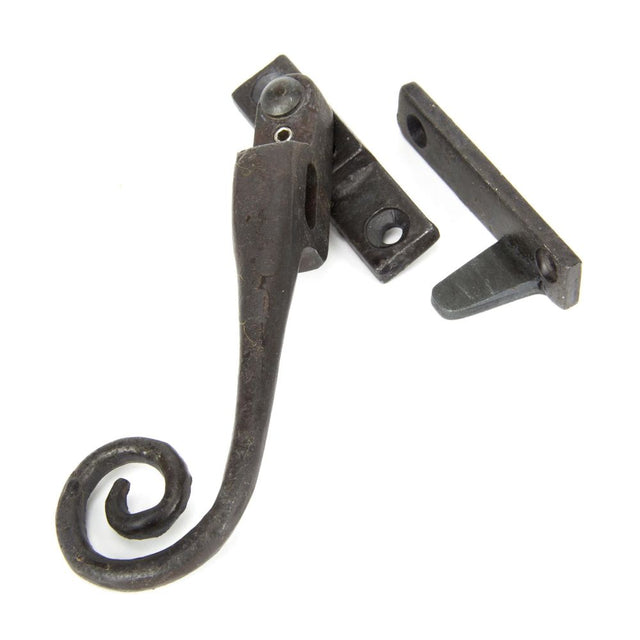 This is an image showing From The Anvil - Beeswax LH Locking Night-vent Monkeytail Fastener available from T.H Wiggans Architectural Ironmongery in Kendal, quick delivery and discounted prices