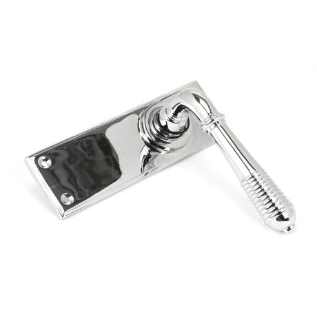 This is an image showing From The Anvil - Polished Chrome Reeded Lever Latch Set available from trade door handles, quick delivery and discounted prices