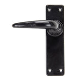 This is an image of From The Anvil - Black Smooth Lever Latch Set available to order from T.H Wiggans Architectural Ironmongery in Kendal, quick delivery and discounted prices.