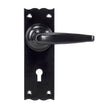 This is an image of From The Anvil - Black Oak Lever Lock Set available to order from T.H Wiggans Architectural Ironmongery in Kendal, quick delivery and discounted prices.