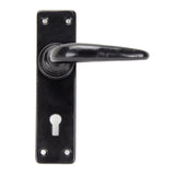 This is an image showing From The Anvil - Black Smooth Lever Lock Set available from trade door handles, quick delivery and discounted prices