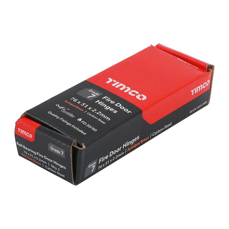 This is an image showing TIMCO Grade 7 Fire Door Hinges - Antique Brass - 76 x 50 x 2.0 - 2 Pieces Box available from T.H Wiggans Ironmongery in Kendal, quick delivery at discounted prices.