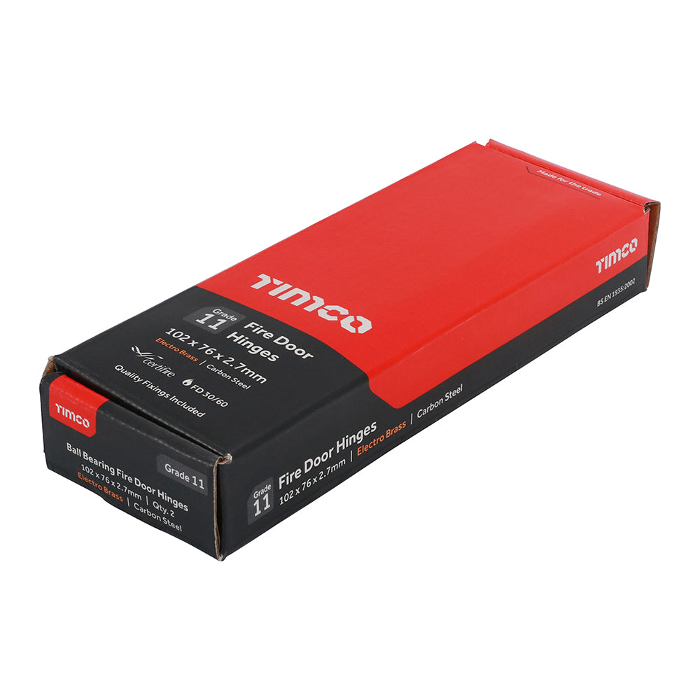 This is an image showing TIMCO Grade 11 Fire Door Hinges - Electro Brass - 101 x 76 x 2.6 - 2 Pieces Box available from T.H Wiggans Ironmongery in Kendal, quick delivery at discounted prices.