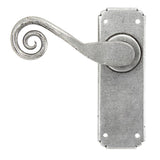 This is an image showing From The Anvil - Pewter Monkeytail Lever Latch Set available from trade door handles, quick delivery and discounted prices