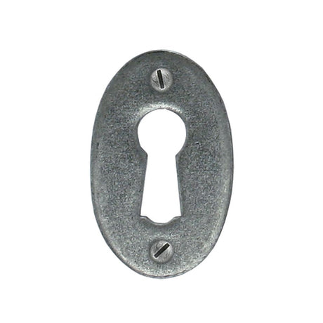 This is an image of From The Anvil - Pewter Oval Escutcheon available to order from T.H Wiggans Architectural Ironmongery in Kendal, quick delivery and discounted prices.