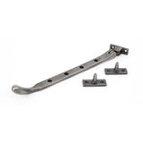 This is an image showing From The Anvil - Antique Pewter 10" Peardrop Stay available from T.H Wiggans Architectural Ironmongery in Kendal, quick delivery and discounted prices