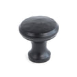 This is an image showing From The Anvil - Black Hammered Cabinet Knob - Small available from T.H Wiggans Architectural Ironmongery in Kendal, quick delivery and discounted prices