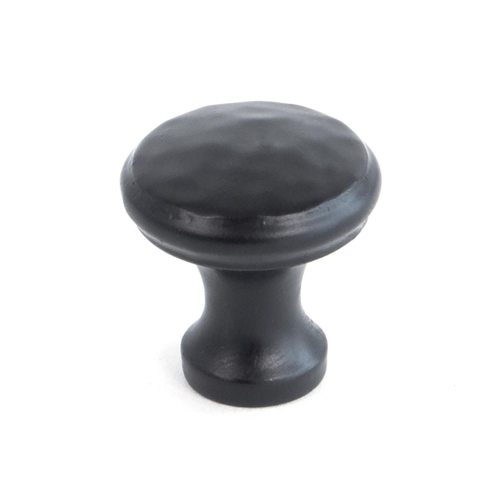 This is an image showing From The Anvil - Black Hammered Cabinet Knob - Small available from T.H Wiggans Architectural Ironmongery in Kendal, quick delivery and discounted prices