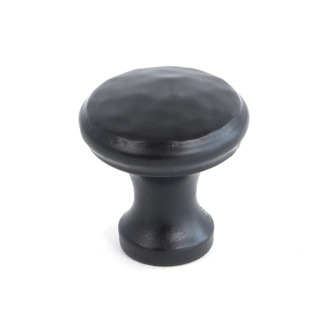 This is an image showing From The Anvil - Black Hammered Cabinet Knob - Small available from T.H Wiggans Architectural Ironmongery in Kendal, quick delivery and discounted prices