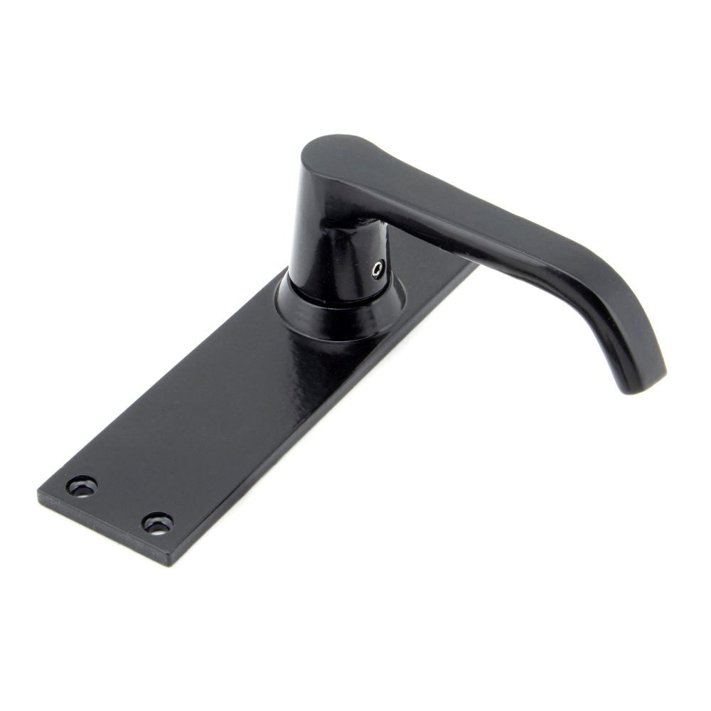 This is an image showing From The Anvil - Black Deluxe Lever Latch Set available from trade door handles, quick delivery and discounted prices