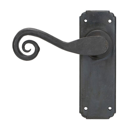 This is an image of From The Anvil - Beeswax Monkeytail Lever Latch Set available to order from T.H Wiggans Architectural Ironmongery in Kendal, quick delivery and discounted prices.