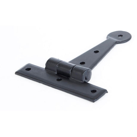 This is an image showing From The Anvil - Black 4" Penny End T Hinge (pair) available from T.H Wiggans Architectural Ironmongery, quick delivery and discounted prices