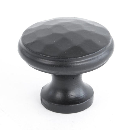 This is an image showing From The Anvil - Black Hammered Cabinet Knob - Medium available from T.H Wiggans Architectural Ironmongery in Kendal, quick delivery and discounted prices