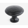This is an image showing From The Anvil - Black Hammered Cabinet Knob - Large available from T.H Wiggans Architectural Ironmongery in Kendal, quick delivery and discounted prices