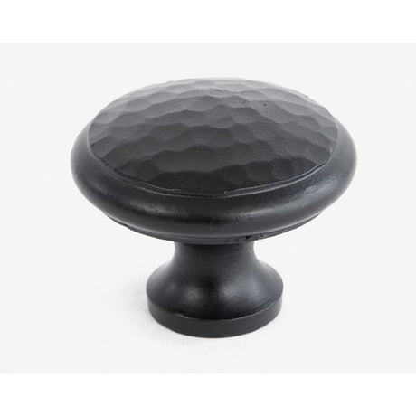 This is an image showing From The Anvil - Black Hammered Cabinet Knob - Large available from T.H Wiggans Architectural Ironmongery in Kendal, quick delivery and discounted prices