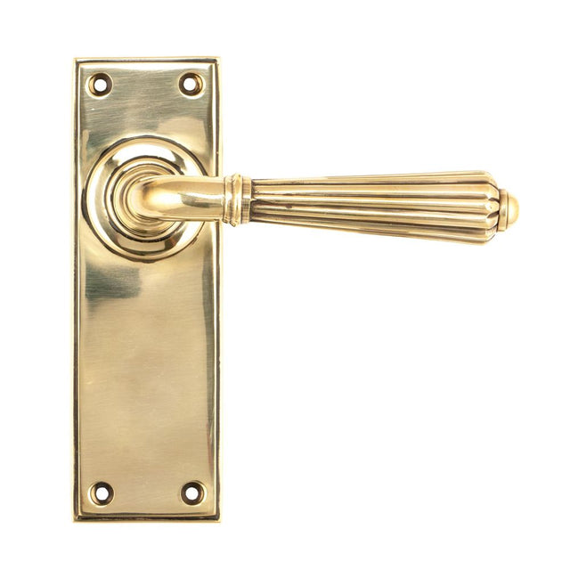 This is an image of From The Anvil - Aged Brass Hinton Lever Latch Set available to order from T.H Wiggans Architectural Ironmongery in Kendal, quick delivery and discounted prices.