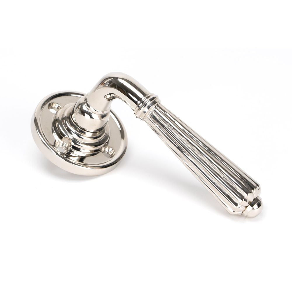 This is an image of From The Anvil - Polished Nickel Hinton Lever on Rose Set available to order from T.H Wiggans Architectural Ironmongery in Kendal, quick delivery and discounted prices.