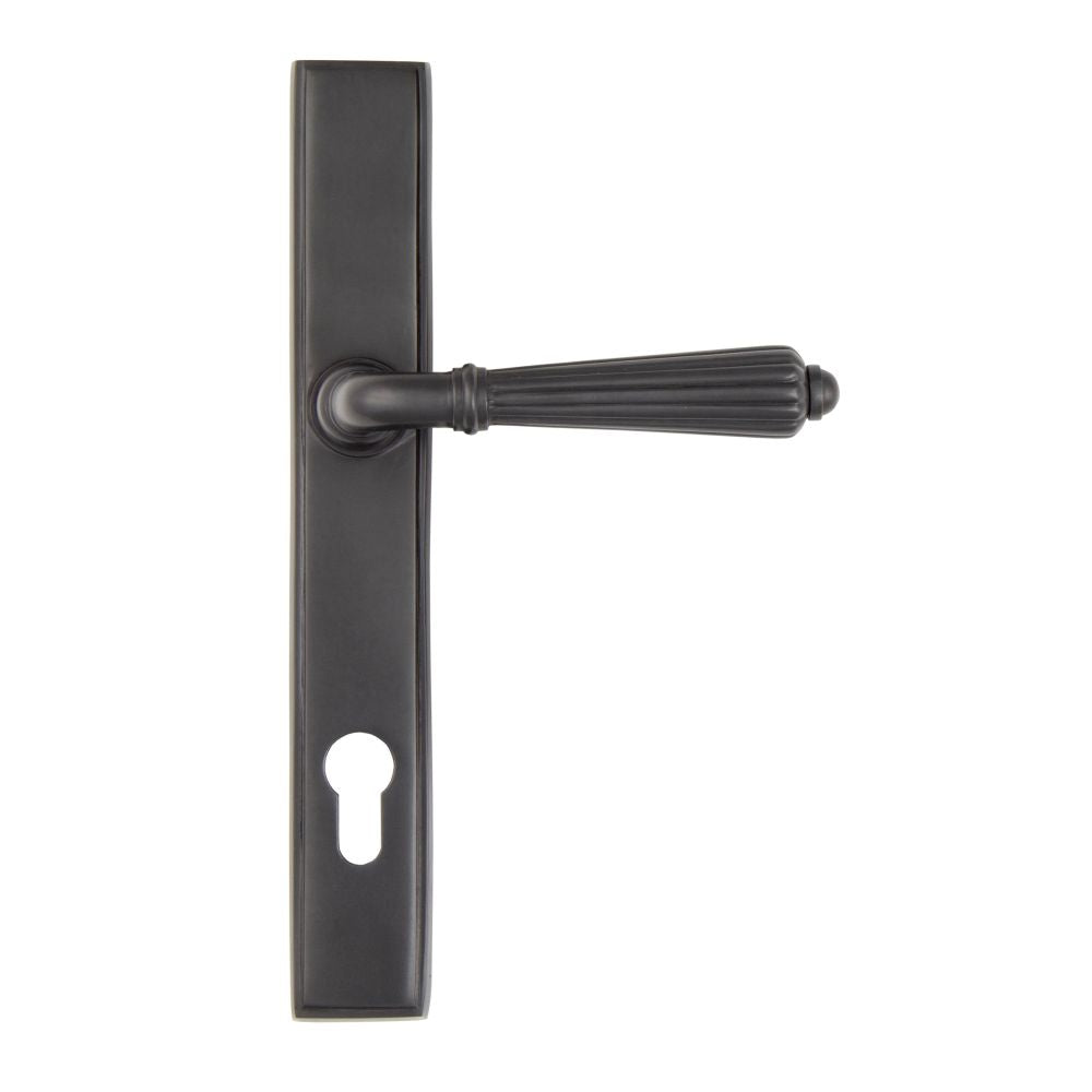 This is an image showing From The Anvil - Aged Bronze Hinton Slimline Lever Espag. Lock Set available from trade door handles, quick delivery and discounted prices