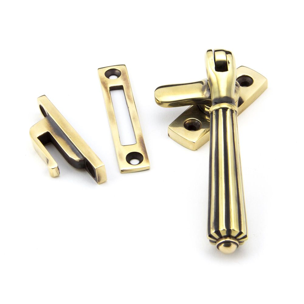 This is an image showing From The Anvil - Aged Brass Locking Hinton Fastener available from T.H Wiggans Architectural Ironmongery in Kendal, quick delivery and discounted prices