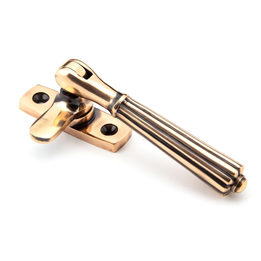 This is an image showing From The Anvil - Polished Bronze Locking Hinton Fastener available from T.H Wiggans Architectural Ironmongery in Kendal, quick delivery and discounted prices