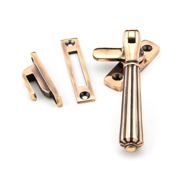 This is an image showing From The Anvil - Polished Bronze Locking Hinton Fastener available from T.H Wiggans Architectural Ironmongery in Kendal, quick delivery and discounted prices