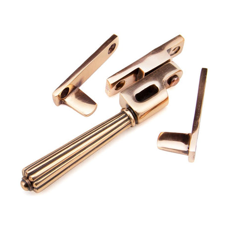 This is an image showing From The Anvil - Polished Bronze Night-Vent Locking Hinton Fastener available from T.H Wiggans Architectural Ironmongery in Kendal, quick delivery and discounted prices