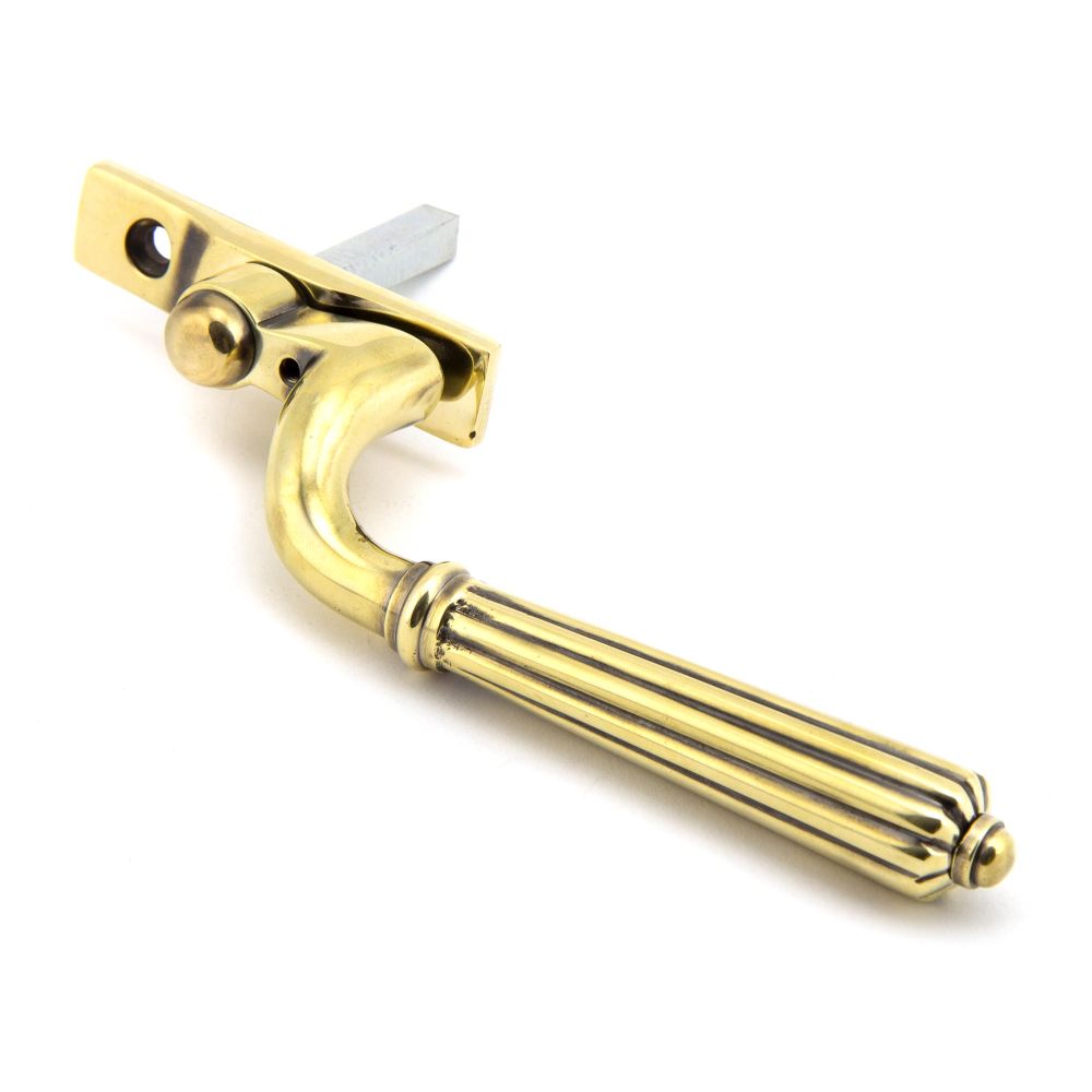 This is an image showing From The Anvil - Aged Brass Hinton Espag - LH available from T.H Wiggans Architectural Ironmongery in Kendal, quick delivery and discounted prices